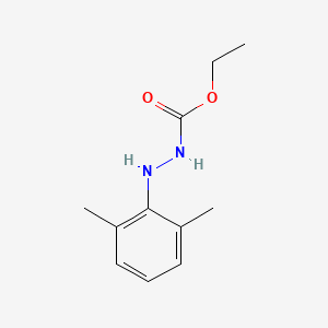 molecular formula C11H16N2O2 B3176762 Ethyl 2-(2,6-dimethylphenyl)hydrazinecarboxylate CAS No. 112341-87-4