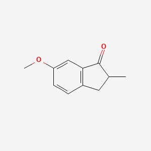 B3178415 6-Methoxy-2-methyl-2,3-dihydro-1h-inden-1-one CAS No. 5464-10-8