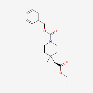 molecular formula C18H23NO4 B3187472 6-Azaspiro[2.5]octane-1,6-dicarboxylic acid, 1-ethyl 6-(phenylmethyl) ester, (1S)- CAS No. 1539277-97-8