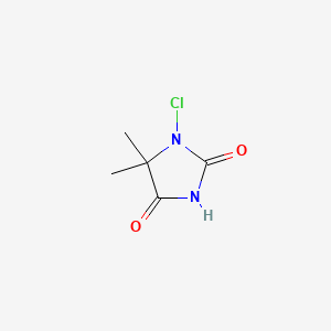 molecular formula C5H7ClN2O2 B3193212 1-Chloro-5,5-dimethylhydantoin CAS No. 6921-17-1