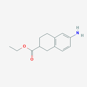 molecular formula C13H17NO2 B3196234 Ethyl 6-amino-1,2,3,4-tetrahydronaphthalene-2-carboxylate CAS No. 97902-63-1