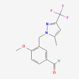 molecular formula C14H13F3N2O2 B3196912 4-methoxy-3-{[5-methyl-3-(trifluoromethyl)-1H-pyrazol-1-yl]methyl}benzaldehyde CAS No. 1001519-27-2