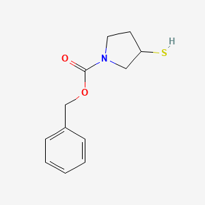 molecular formula C12H15NO2S B3197342 Benzyl 3-mercaptopyrrolidine-1-carboxylate CAS No. 100472-48-8