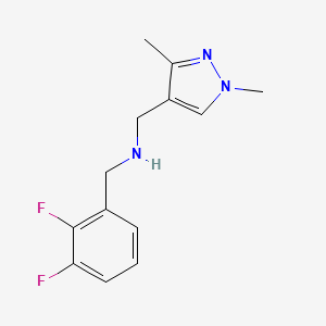 molecular formula C13H15F2N3 B3197691 N-(2,3-Difluorobenzyl)-1-(1,3-dimethyl-1H-pyrazol-4-yl)methanamine CAS No. 1006473-17-1