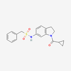 molecular formula C19H20N2O3S B3198216 N-(1-cyclopropanecarbonyl-2,3-dihydro-1H-indol-6-yl)-1-phenylmethanesulfonamide CAS No. 1010883-95-0