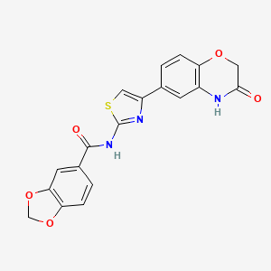 molecular formula C19H13N3O5S B3198303 N-[4-(3-oxo-3,4-dihydro-2H-1,4-benzoxazin-6-yl)-1,3-thiazol-2-yl]-2H-1,3-benzodioxole-5-carboxamide CAS No. 1011578-82-7