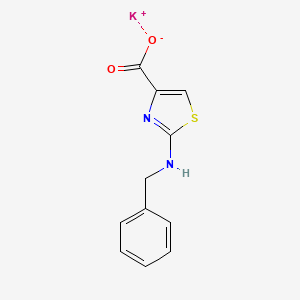 molecular formula C11H9KN2O2S B3198530 Potassium 2-(benzylamino)-1,3-thiazole-4-carboxylate CAS No. 1015533-61-5