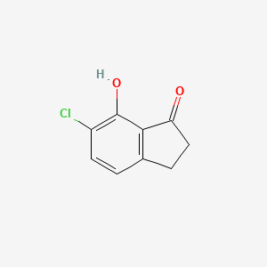 molecular formula C9H7ClO2 B3200548 6-Chloro-7-hydroxy-2,3-dihydro-1H-inden-1-one CAS No. 101819-36-7