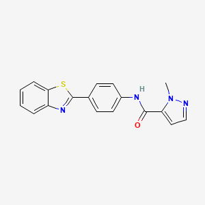 molecular formula C18H14N4OS B3201006 N-[4-(1,3-benzothiazol-2-yl)phenyl]-1-methyl-1H-pyrazole-5-carboxamide CAS No. 1019096-88-8