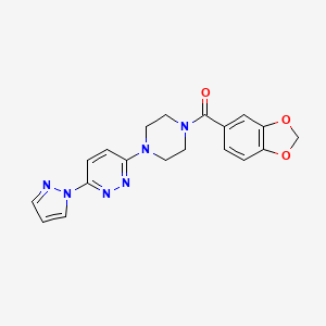 B3201050 (4-(6-(1H-pyrazol-1-yl)pyridazin-3-yl)piperazin-1-yl)(benzo[d][1,3]dioxol-5-yl)methanone CAS No. 1019100-78-7
