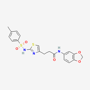 molecular formula C20H19N3O5S2 B3206541 N-(2H-1,3-benzodioxol-5-yl)-3-[2-(4-methylbenzenesulfonamido)-1,3-thiazol-4-yl]propanamide CAS No. 1040670-10-7