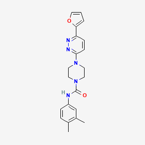 molecular formula C21H23N5O2 B3207865 N-(3,4-dimethylphenyl)-4-[6-(furan-2-yl)pyridazin-3-yl]piperazine-1-carboxamide CAS No. 1049175-72-5
