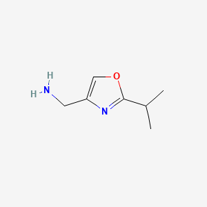 molecular formula C7H12N2O B3208744 [2-(propan-2-yl)-1,3-oxazol-4-yl]methanamine CAS No. 1053059-18-9
