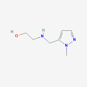 molecular formula C7H13N3O B3215005 2-{[(1-methyl-1H-pyrazol-5-yl)methyl]amino}ethan-1-ol CAS No. 1157105-13-9