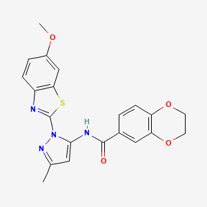 molecular formula C21H18N4O4S B3216384 N-(1-(6-methoxybenzo[d]thiazol-2-yl)-3-methyl-1H-pyrazol-5-yl)-2,3-dihydrobenzo[b][1,4]dioxine-6-carboxamide CAS No. 1171743-86-4