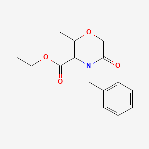 molecular formula C15H19NO4 B3240940 Ethyl 4-benzyl-2-methyl-5-oxomorpholine-3-carboxylate CAS No. 1449136-35-9