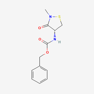 molecular formula C12H14N2O3S B3250937 benzyl N-[(4R)-2-methyl-3-oxo-1,2-thiazolidin-4-yl]carbamate CAS No. 2059909-52-1