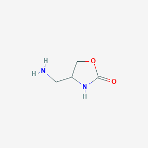 molecular formula C4H8N2O2 B032542 4-(Aminomethyl)-1,3-oxazolidin-2-one CAS No. 166395-15-9
