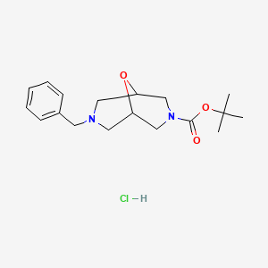 molecular formula C18H27ClN2O3 B3260887 tert-Butyl 7-benzyl-9-oxa-3,7-diazabicyclo[3.3.1]nonane-3-carboxylate hydrochloride CAS No. 335620-99-0