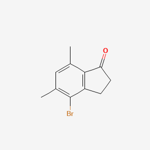 B3287207 4-Bromo-5,7-dimethyl-2,3-dihydro-1H-inden-1-one CAS No. 84092-73-9