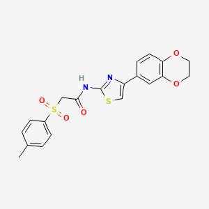 molecular formula C20H18N2O5S2 B3297411 N-[4-(2,3-dihydro-1,4-benzodioxin-6-yl)-1,3-thiazol-2-yl]-2-(4-methylbenzenesulfonyl)acetamide CAS No. 895447-40-2