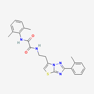 molecular formula C23H23N5O2S B3297565 N'-(2,6-dimethylphenyl)-N-{2-[2-(2-methylphenyl)-[1,2,4]triazolo[3,2-b][1,3]thiazol-6-yl]ethyl}ethanediamide CAS No. 895791-30-7