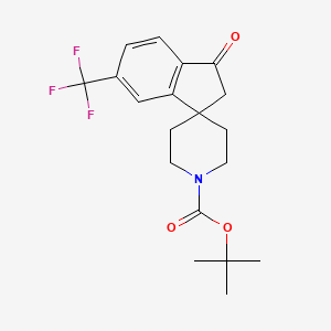 molecular formula C19H22F3NO3 B3301539 Tert-butyl 3-oxo-6-(trifluoromethyl)-2,3-dihydrospiro[indene-1,4'-piperidine]-1'-carboxylate CAS No. 910442-62-5