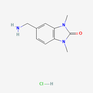 molecular formula C10H14ClN3O B3309880 5-(aminomethyl)-1,3-dimethyl-1,3-dihydro-2H-benzimidazol-2-one hydrochloride CAS No. 943845-91-8