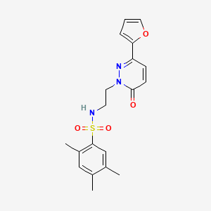 molecular formula C19H21N3O4S B3310641 N-{2-[3-(furan-2-yl)-6-oxo-1,6-dihydropyridazin-1-yl]ethyl}-2,4,5-trimethylbenzene-1-sulfonamide CAS No. 946212-17-5