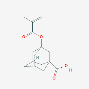 molecular formula C15H20O4 B033163 1-Carboxy-3-methacryloyloxyadamantane CAS No. 212580-10-4