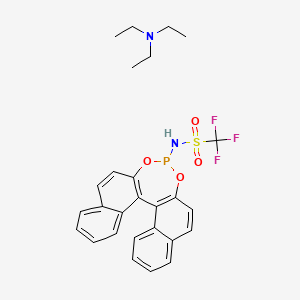 molecular formula C27H28F3N2O4PS B3324177 N,N-diethylethanamine;N-(12,14-dioxa-13-phosphapentacyclo[13.8.0.02,11.03,8.018,23]tricosa-1(15),2(11),3,5,7,9,16,18,20,22-decaen-13-yl)-1,1,1-trifluoromethanesulfonamide CAS No. 1808205-87-9