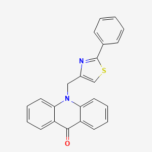 B3355739 10-[(2-Phenyl-1,3-thiazol-4-yl)methyl]acridin-9(10H)-one CAS No. 63484-60-6