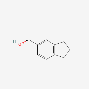 molecular formula C11H14O B3365230 (1R)-1-(2,3-dihydro-1H-inden-5-yl)ethan-1-ol CAS No. 1212314-66-3