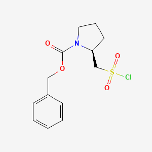 (S)-2-Chlorosulfonylmethyl-pyrrolidine-1-carboxylic acid benzyl ester