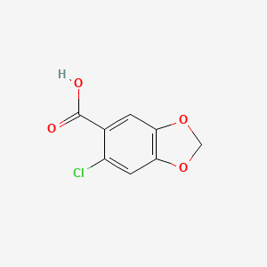 molecular formula C8H5ClO4 B3381652 6-chloro-1,3-dioxaindane-5-carboxylic acid CAS No. 2591-26-6