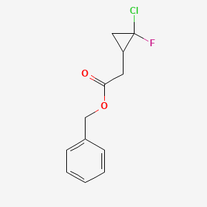 molecular formula C12H12ClFO2 B3391003 Cyclopropaneacetic acid, 2-chloro-2-fluoro-, phenylmethyl ester CAS No. 132656-21-4