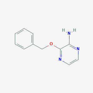 molecular formula C11H11N3O B033915 2-Amino-3-benzyloxypyrazine CAS No. 110223-15-9