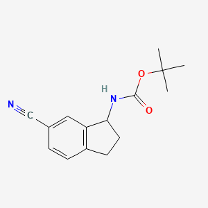 molecular formula C15H18N2O2 B3391545 Tert-butyl (6-cyano-2,3-dihydro-1H-inden-1-YL)carbamate CAS No. 1823271-09-5
