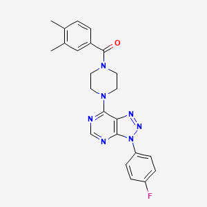 molecular formula C23H22FN7O B3412495 1-(3,4-dimethylbenzoyl)-4-[3-(4-fluorophenyl)-3H-[1,2,3]triazolo[4,5-d]pyrimidin-7-yl]piperazine CAS No. 933012-65-8
