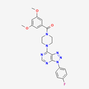 molecular formula C23H22FN7O3 B3413402 1-(3,5-dimethoxybenzoyl)-4-[3-(4-fluorophenyl)-3H-[1,2,3]triazolo[4,5-d]pyrimidin-7-yl]piperazine CAS No. 946229-65-8