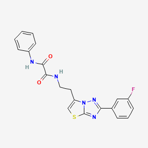 molecular formula C20H16FN5O2S B3413821 N-{2-[2-(3-fluorophenyl)-[1,2,4]triazolo[3,2-b][1,3]thiazol-6-yl]ethyl}-N'-phenylethanediamide CAS No. 946273-41-2