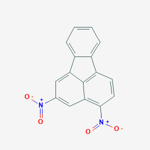 molecular formula C16H8N2O4 B034631 Fluoranthene, 2,4-dinitro- CAS No. 102493-19-6