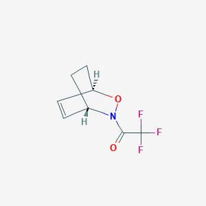 molecular formula C8H8F3NO2 B034824 2,2,2-Trifluoro-1-[(1R,4S)-2-oxa-3-azabicyclo[2.2.2]oct-5-en-3-yl]ethanone CAS No. 110568-59-7
