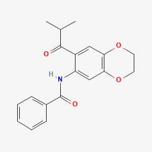 molecular formula C19H19NO4 B3611578 N-[7-(2-methylpropanoyl)-2,3-dihydro-1,4-benzodioxin-6-yl]benzamide 