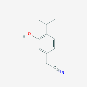 molecular formula C11H13NO B037759 [3-Hydroxy-4-(propan-2-yl)phenyl]acetonitrile CAS No. 114649-71-7