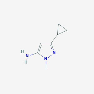 molecular formula C7H11N3 B039020 3-环丙基-1-甲基-1H-吡唑-5-胺 CAS No. 118430-74-3