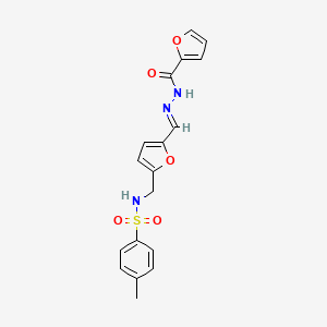 molecular formula C18H17N3O5S B3918131 N-[(E)-[5-[[(4-methylphenyl)sulfonylamino]methyl]furan-2-yl]methylideneamino]furan-2-carboxamide 
