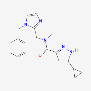 molecular formula C19H21N5O B3923632 N-[(1-benzylimidazol-2-yl)methyl]-5-cyclopropyl-N-methyl-1H-pyrazole-3-carboxamide 