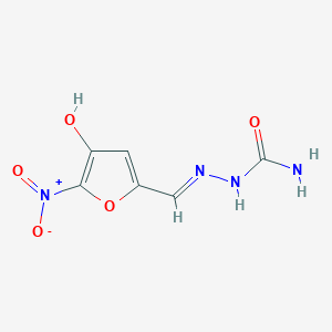molecular formula C6H6N4O5 B040222 4-Hydroxynitrofurazone CAS No. 113849-13-1