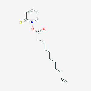 molecular formula C16H23NO2S B040371 1-[(Undec-10-enoyl)oxy]pyridine-2(1H)-thione CAS No. 114050-28-1